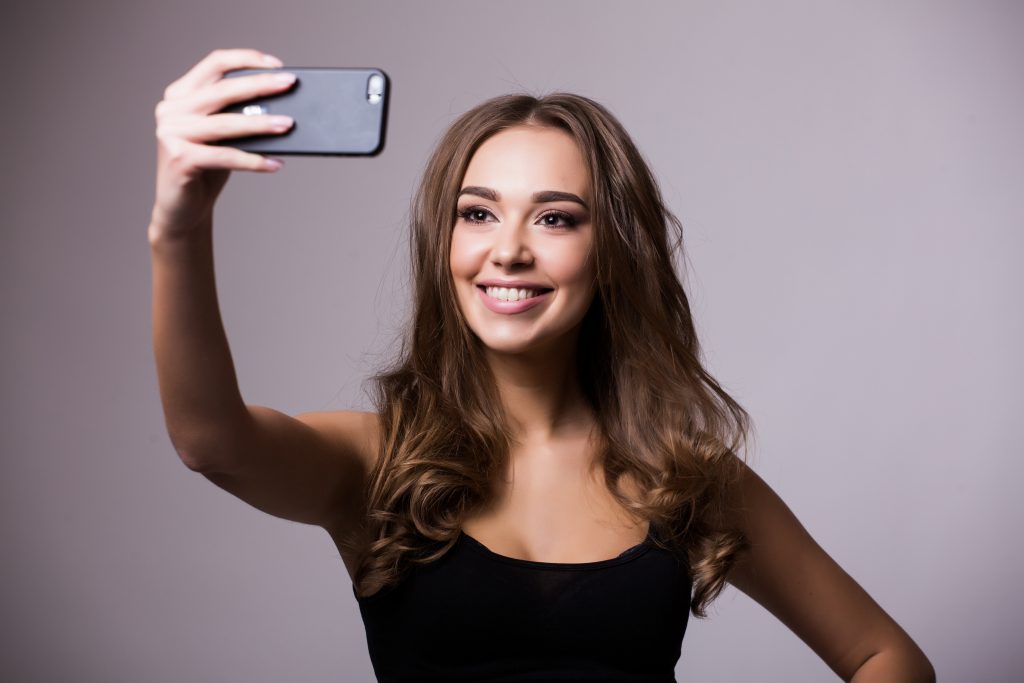 woman taking selfie